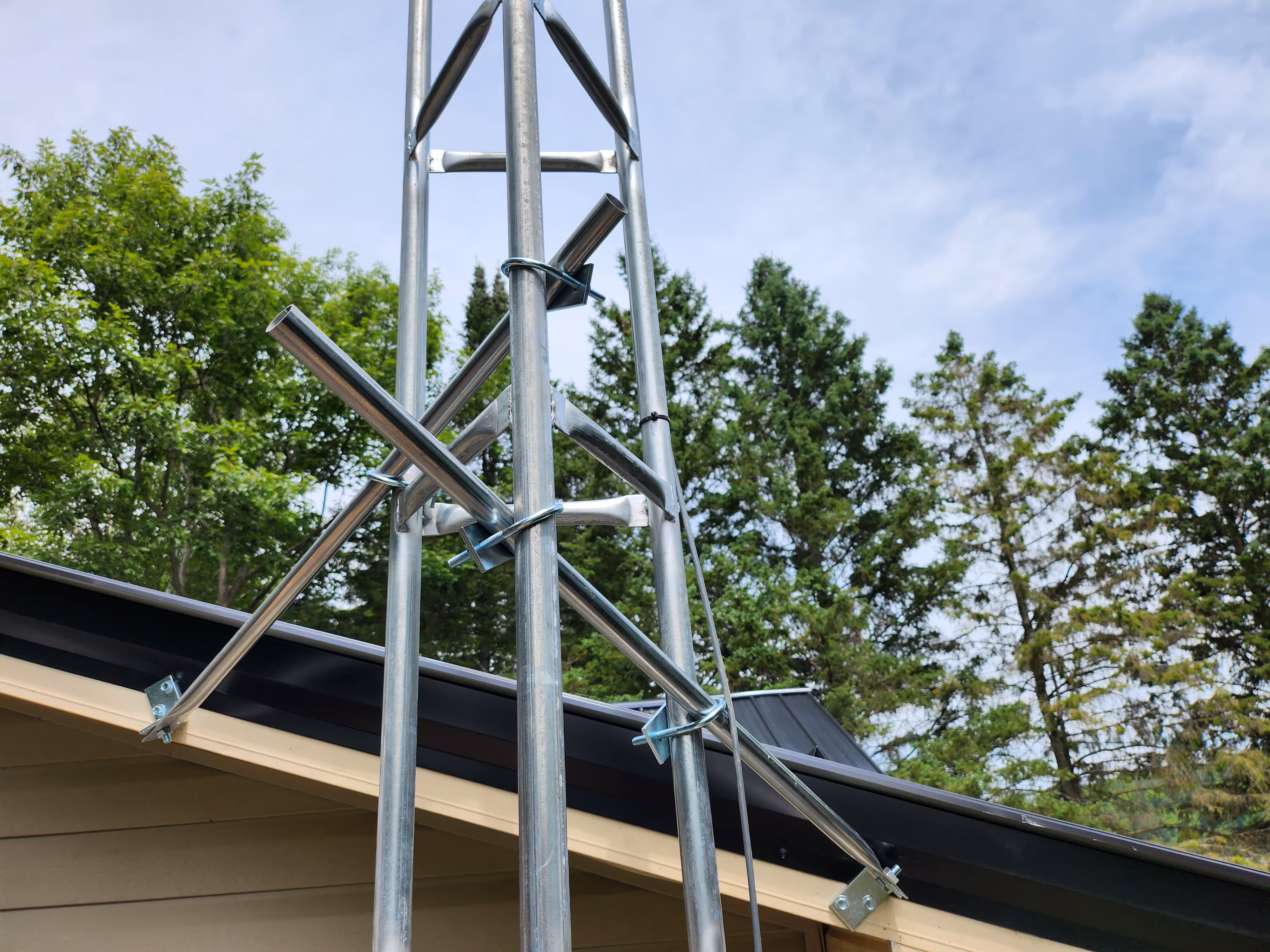 starlink tower attached to the side of a building